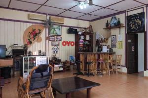 Μια τηλεόραση ή/και κέντρο ψυχαγωγίας στο OYO 89928 ACF Guest House