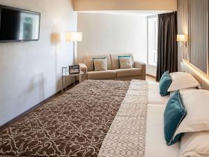 Posteľ alebo postele v izbe v ubytovaní Mercure Monte Igueldo