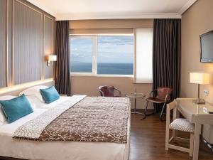 Posteľ alebo postele v izbe v ubytovaní Mercure Monte Igueldo
