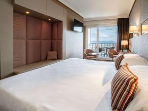 Posteľ alebo postele v izbe v ubytovaní Mercure Monte Igueldo