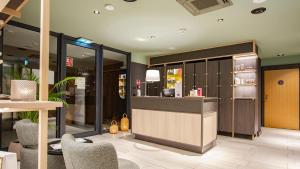 Khu vực ghế ngồi tại VacationClub - Royal Tulip Sand Apartament 431 +14 ảnh