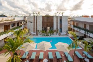 an aerial view of a building with a swimming pool at Samawa Living in Paje
