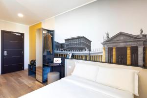 Postel nebo postele na pokoji v ubytování B&B Hotel Roma Fiumicino Aeroporto Fiera 1 + 25 fotografií