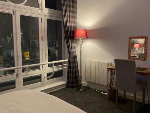 Ένα ή περισσότερα κρεβάτια σε δωμάτιο στο The Art Flat Glasgow
