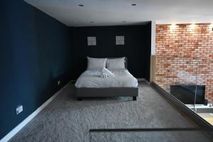 Ένα ή περισσότερα κρεβάτια σε δωμάτιο στο Stunning City Centre Duplex