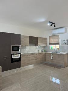 Kuchyň nebo kuchyňský kout v ubytování Magical modern apartment