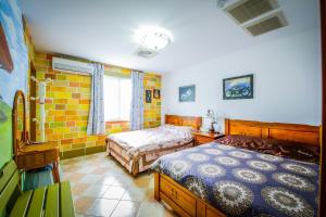 Una cama o camas en una habitación de Peas Country House