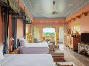 Raffles Jaipur客房内的一张或多张床位