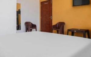 Μια τηλεόραση ή/και κέντρο ψυχαγωγίας στο Hotel Negi Palace by StayApart