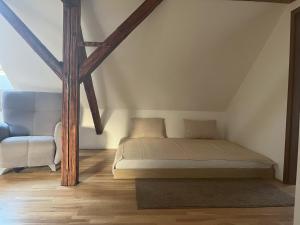 Postel nebo postele na pokoji v ubytování Apartmán MUV