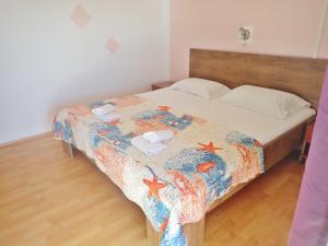 Postel nebo postele na pokoji v ubytování Apartments Bili