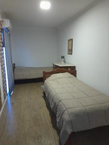 Postel nebo postele na pokoji v ubytování Rojas 329 B