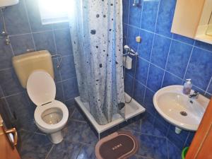 Koupelna v ubytování Apartments Bili