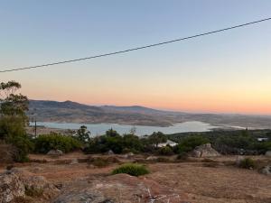 a view of a lake from the top of a hill at The Endless Enigma in Tazroutane