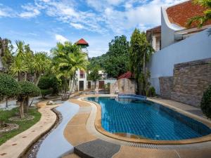 Kolam renang di atau dekat dengan Coast Charm 6BR House Karon