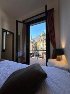 Voodi või voodid majutusasutuse Hotel Croce Federale toas