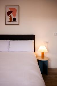 Postel nebo postele na pokoji v ubytování Hotel Gran Vía by gaiarooms