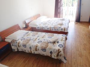 Postel nebo postele na pokoji v ubytování Apartments Bili