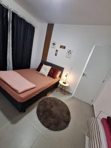 Postel nebo postele na pokoji v ubytování Apartamento com suíte