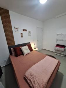 Postel nebo postele na pokoji v ubytování Apartamento com suíte