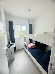 Postel nebo postele na pokoji v ubytování Apartamento com suíte + 23 fotografií