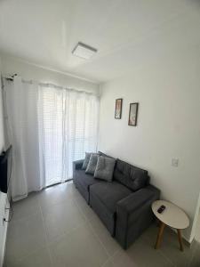 Posezení v ubytování Apartamento com suíte