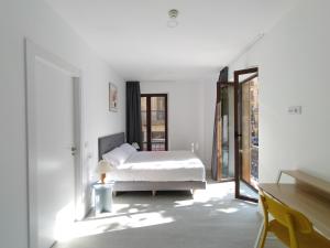 Postel nebo postele na pokoji v ubytování Hotel Gran Vía by gaiarooms