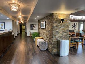Posezení v ubytování The Addison Hotel SureStay Collection by Best Western