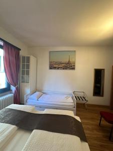 Voodi või voodid majutusasutuse Hotel Croce Federale toas