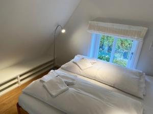 Postel nebo postele na pokoji v ubytování Doras Hus