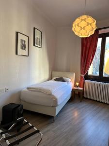 Voodi või voodid majutusasutuse Hotel Croce Federale toas
