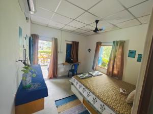 Llit o llits en una habitació de Vibes and Dives