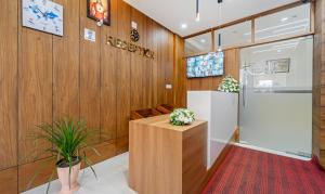 Kuchyň nebo kuchyňský kout v ubytování Treebo Thoduvas Star Plaza Cochin Airport