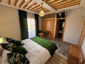 Ferme d'hôtes Bladna Garden客房内的一张或多张床位