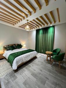 Ferme d'hôtes Bladna Garden客房内的一张或多张床位
