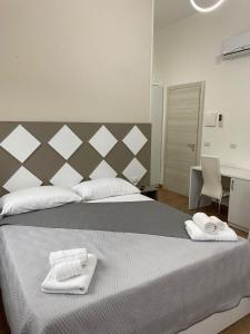 Postel nebo postele na pokoji v ubytování B&B Mast’ Nicola