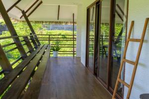 Balkón nebo terasa v ubytování La Fuga Siargao