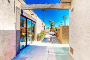 a building with a store window and a sidewalk at The Frey in Palm Springs