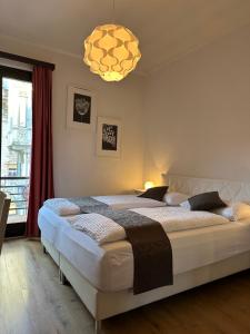 Voodi või voodid majutusasutuse Hotel Croce Federale toas