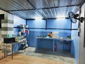 Kuchyň nebo kuchyňský kout v ubytování Inspire 888 Poolvilla & Resort