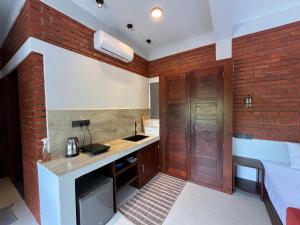 Kuchyň nebo kuchyňský kout v ubytování Coastal Hideaway