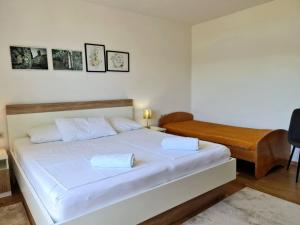 Postel nebo postele na pokoji v ubytování Apartments Citkovic