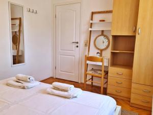 Postel nebo postele na pokoji v ubytování Apartments Citkovic