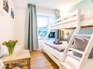 Ein Bett oder Betten in einem Zimmer der Unterkunft FeWo Prora - PRORA week