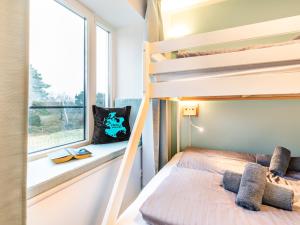Ein Bett oder Betten in einem Zimmer der Unterkunft FeWo Prora - PRORA week