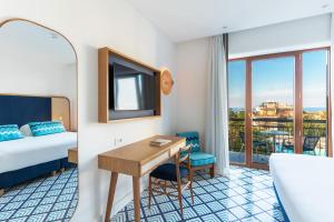 Кровать или кровати в номере Grand Hotel Flora