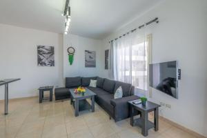 Χώρος καθιστικού στο Luxury apartment on the pool