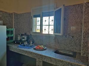 Η κουζίνα ή μικρή κουζίνα στο Sahara Apartements