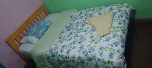 Postel nebo postele na pokoji v ubytování Greenfield Homestay -Full board