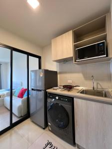 Kuchyň nebo kuchyňský kout v ubytování Dcondo Reef Modern Condos 1&2 Bedrooms